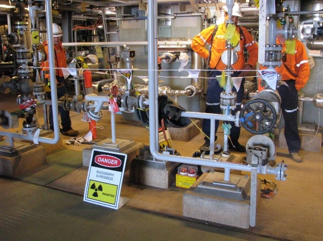 personnel-standing-close-to-SafeRad-radiography-system Personnel standing close to SafeRad radiography system